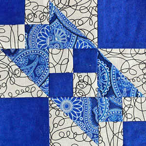 Learn how to make a Broken Sugar Bowl quilt block