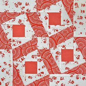 Learn how to piece a Whirling Square quilt block 